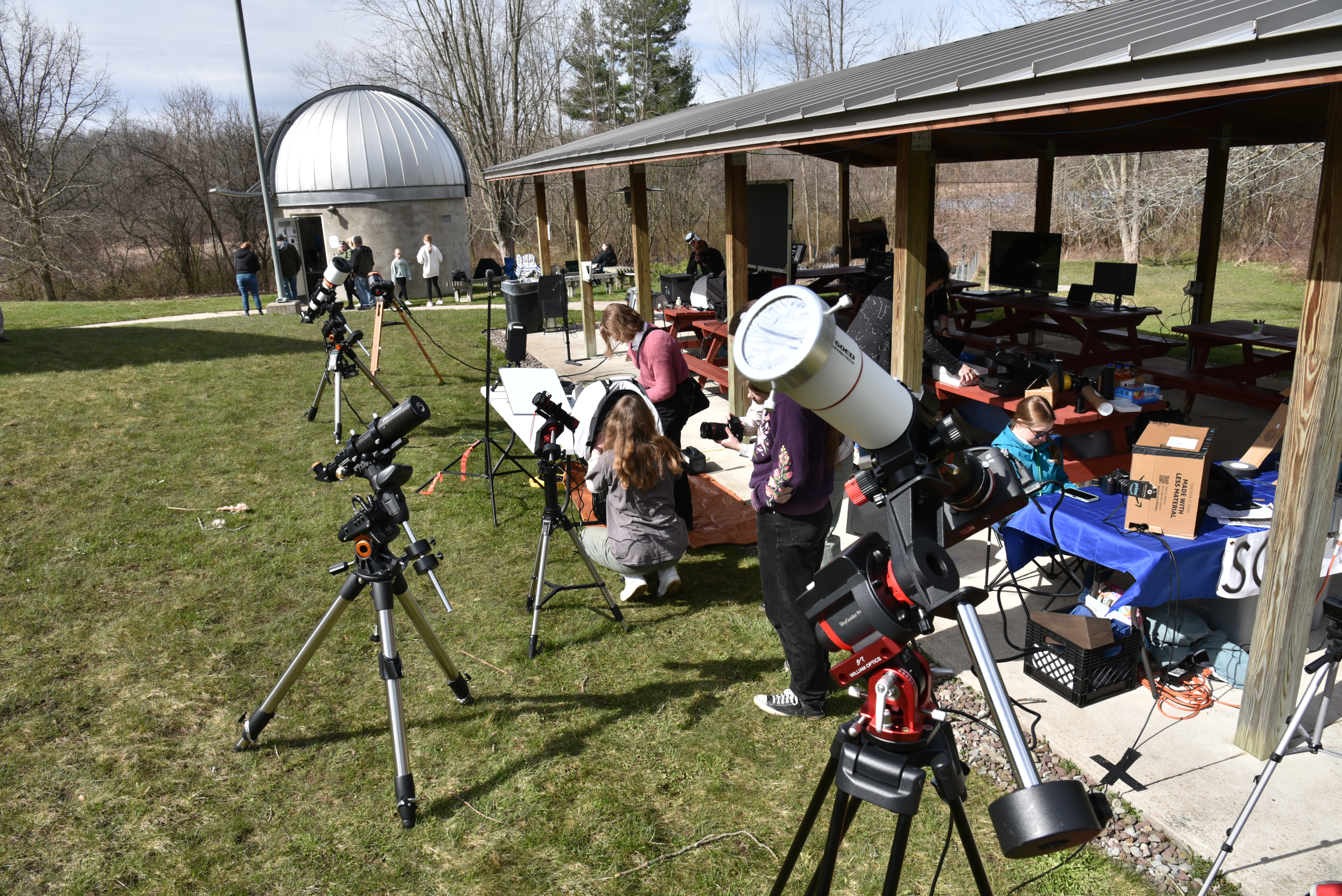 Groups including the Syracuse Astronomical Society, Kopernik Observation Science Center, Pompey Observatory and others set up telescopes with video at Rice Creek Field Station leading into and during the eclipse.