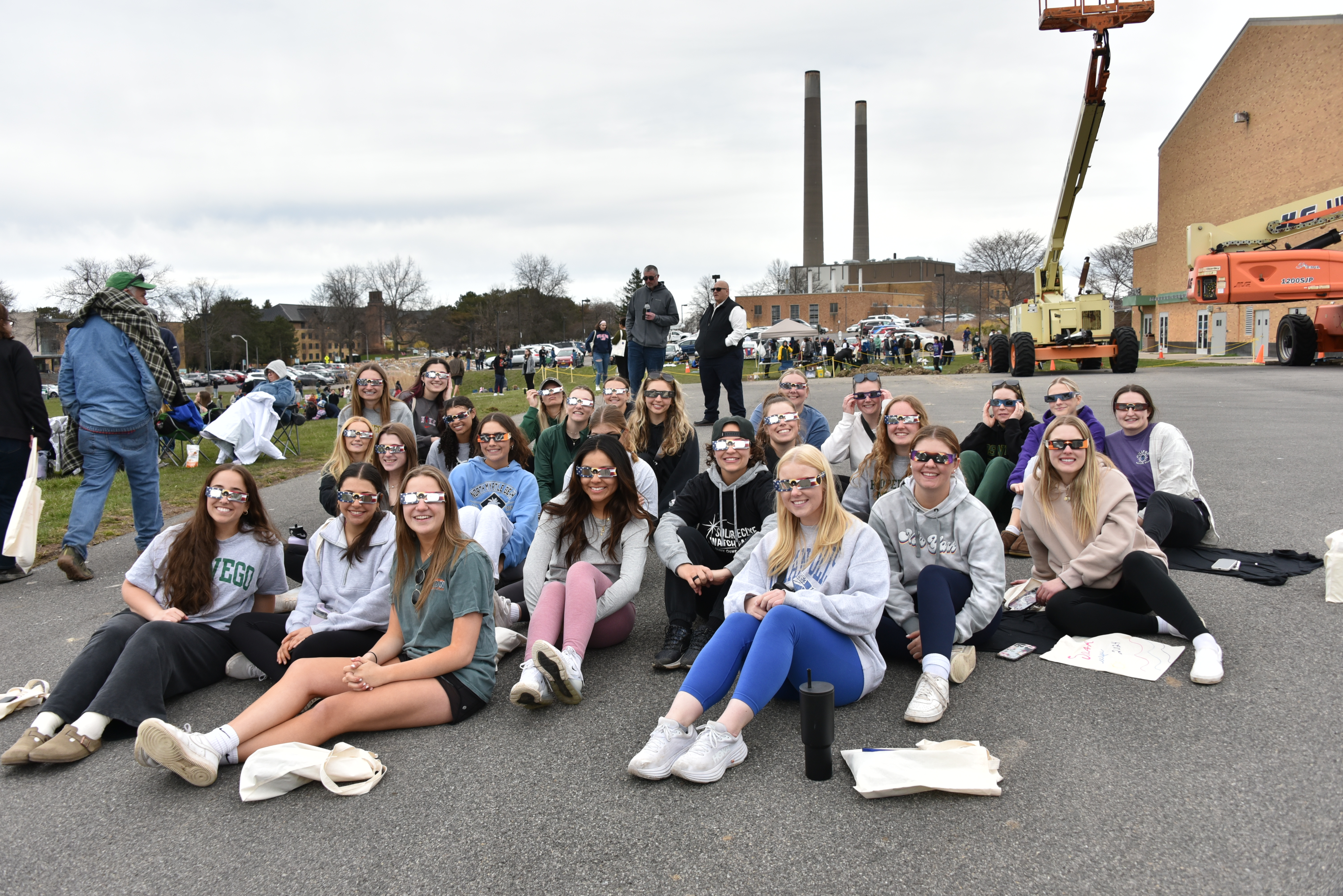 The Laker women's softball team were among the hundreds of campus community members gathered at the Eclipse Viewing Party on Swetman Field.