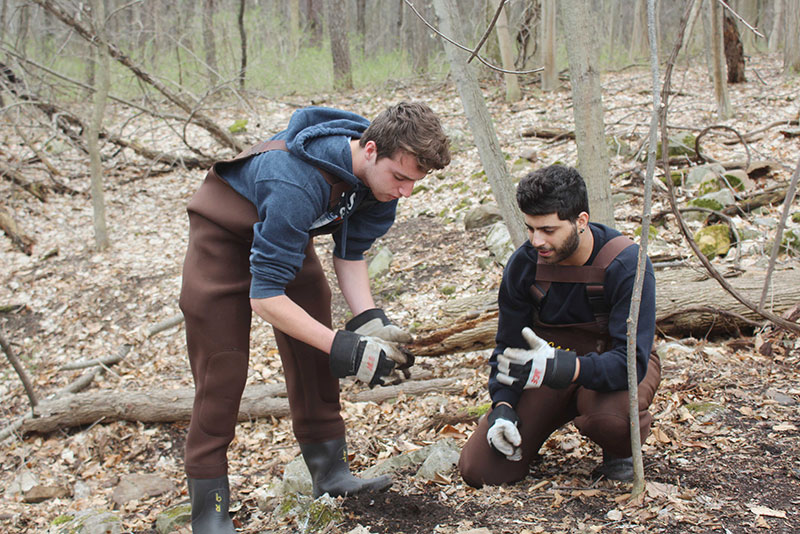 Students help clean Rice Creek grounds