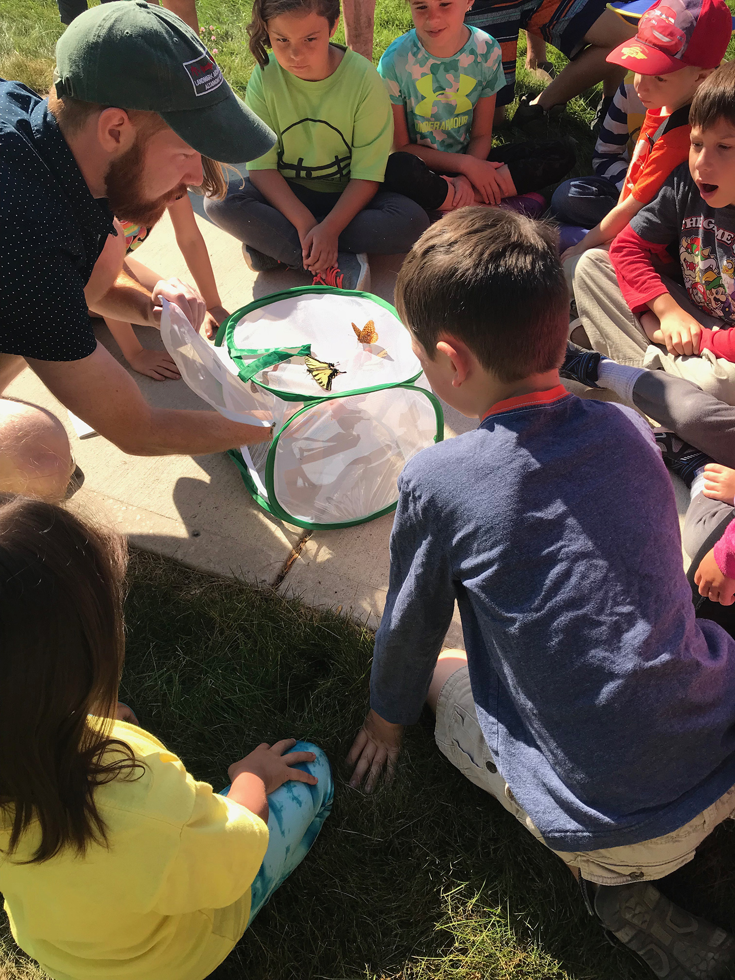  Joe McCarthy showing children butterflies