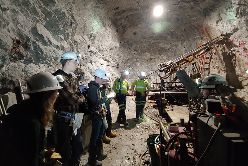 Students in Nicholas DiFrancesco’s “Special Topics in Economic Geology” course look at sphalerite deposits (zinc ore) in the Balmat mining district of the Empire State Mine upstate near Gouverneur during a field trip.