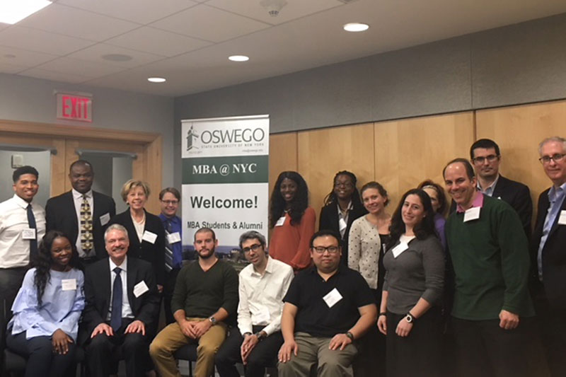 Online MBA and MBA health services administration students gather with administrators at the SUNY Global Center in New York City