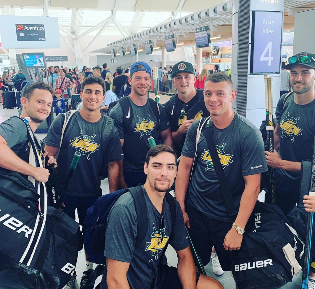 Laker hockey players in an Italian airport