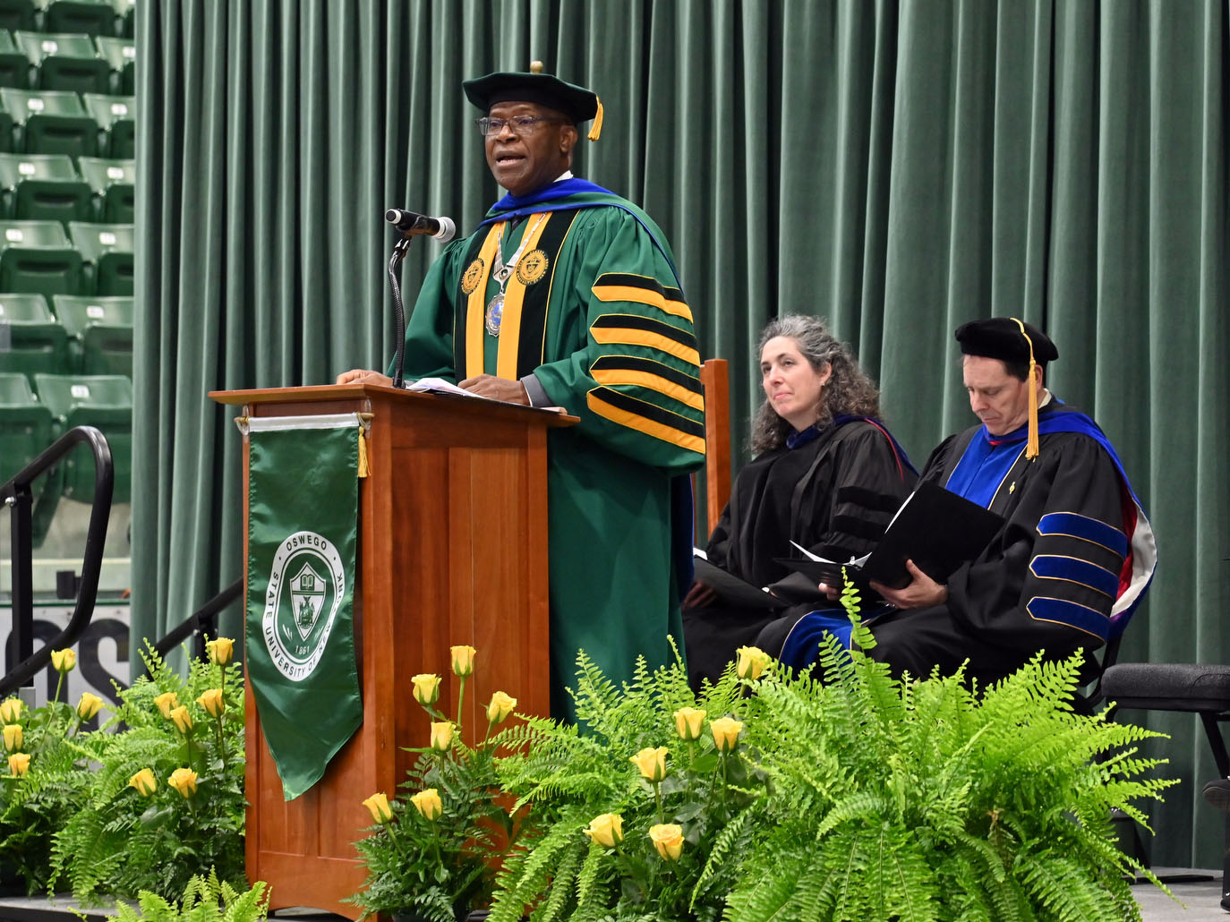 President Peter O. Nwosu speaks during the annual Honors Convocation, a ceremony recognizing student achievement. The event, sponsored by Vega, the Junior and Senior Honor Society, took place on April 25 in the Deborah F. Stanley Arena and Convocation Hall.
