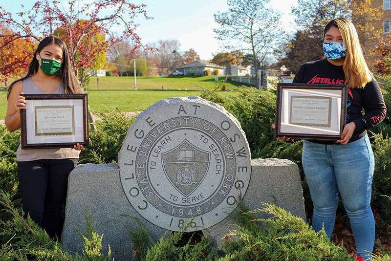 The Latino Student Union announced that, from left, Jayvana Perez and Yadi Aranda Burgos are this year's recipients of the Eugenio Maria de Hostos Scholarship