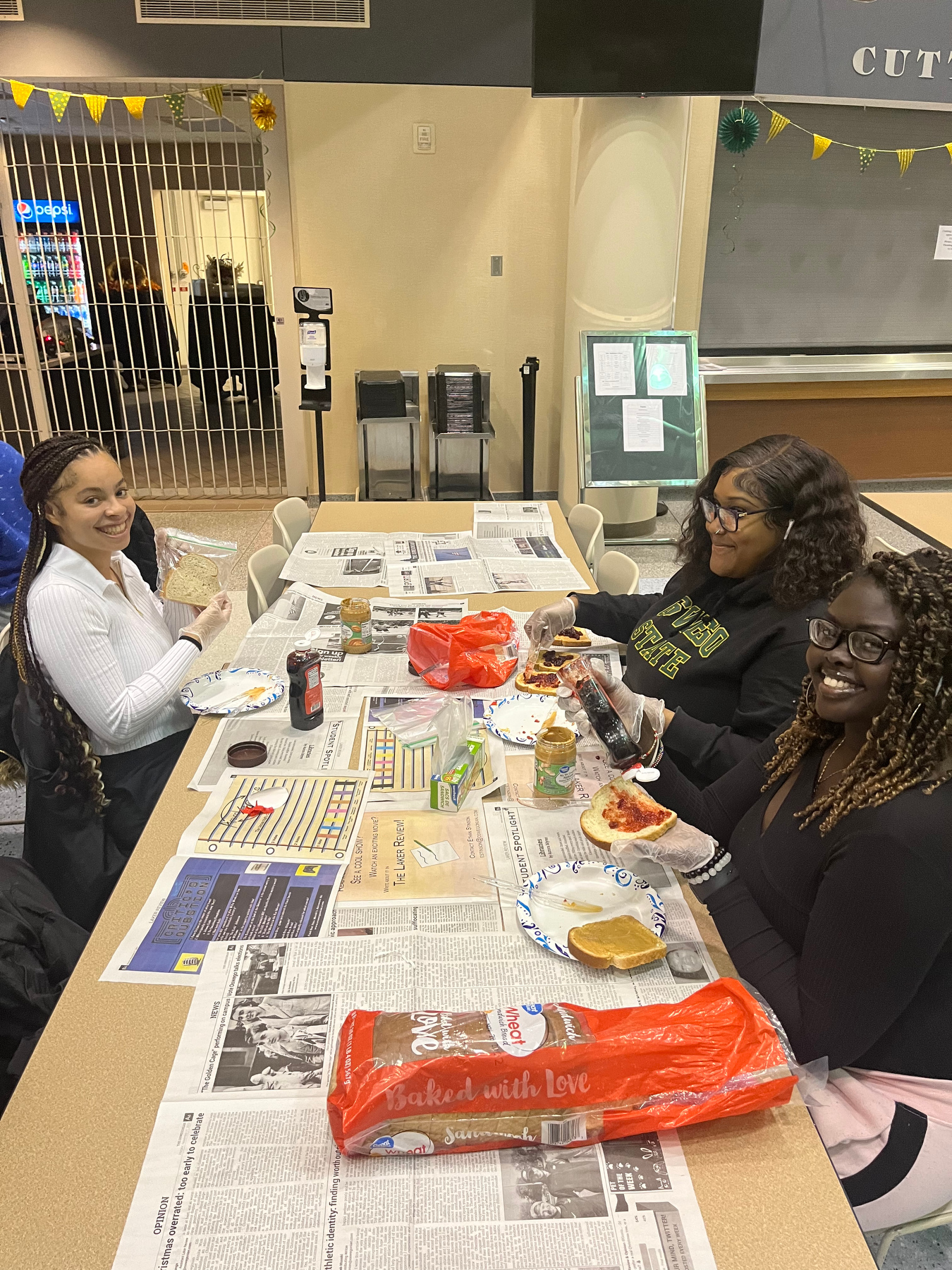 The African Student Organization (ASO) and African-American Males’ Empowerment Network (AAMEN) hosted an event called PB&J: Peanut Butter and Jams event on Nov. 17 in the Marano Campus Center food and activities court where they assembled sandwiches for the homeless and those in need. (Photo by Kashaun Blackman)