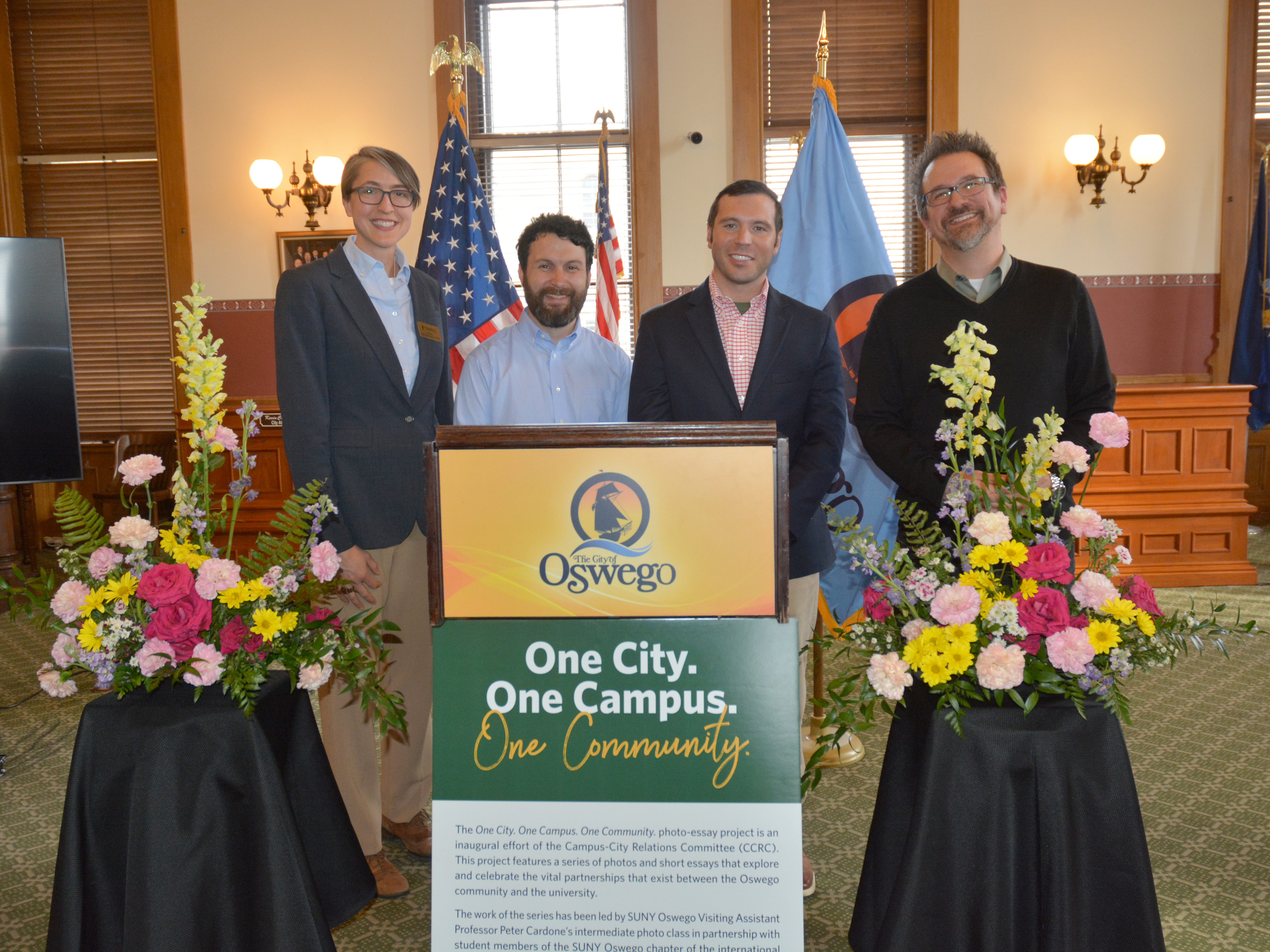 A May 2 reception celebrated SUNY Oswego's student-produced writing and photography exhibit, "One City, One Campus, One Community" exploring the vital partnership between the Oswego community and the university, and showcasing the ongoing collaborative work of the Campus-City Relations Committee.