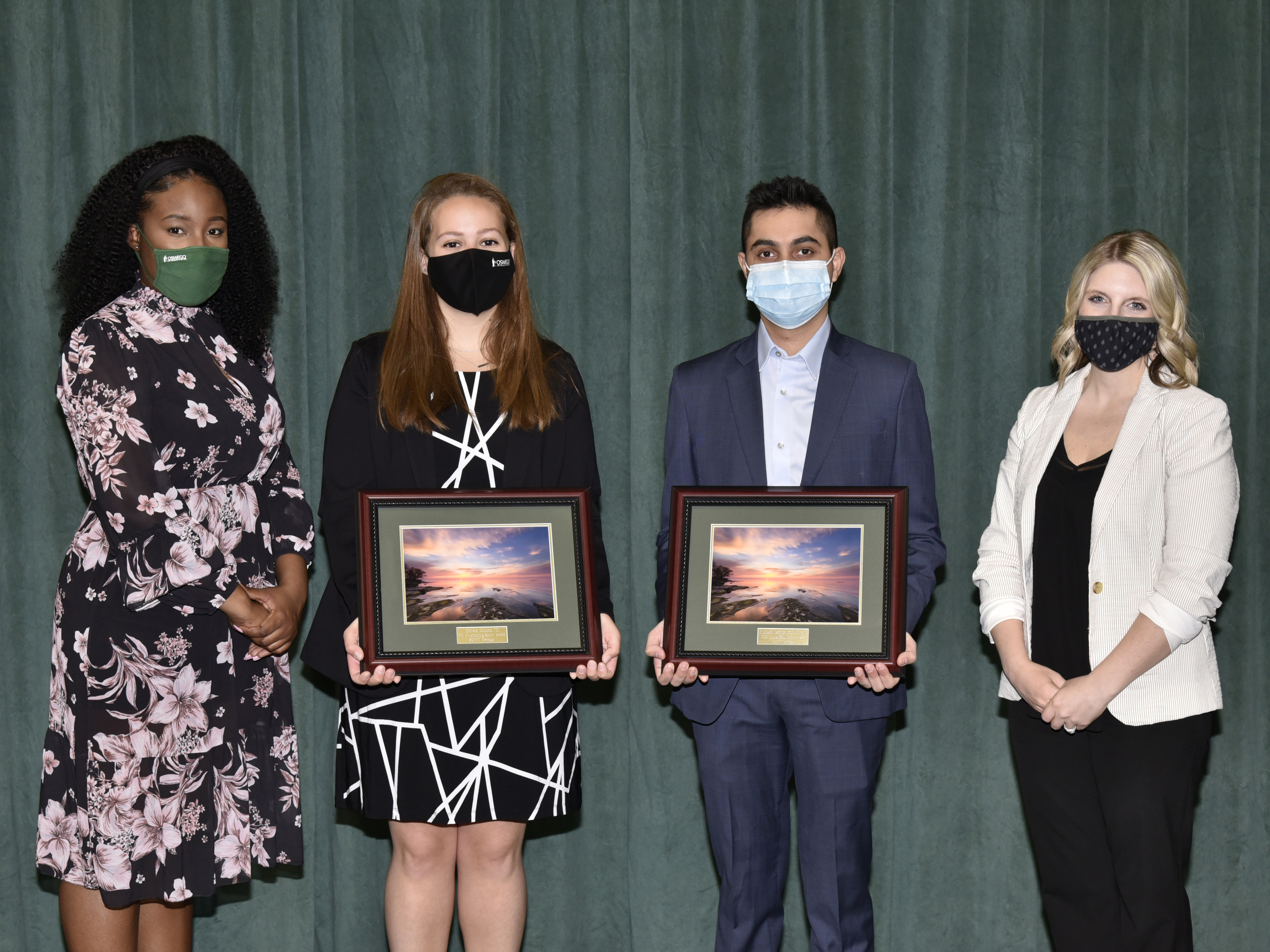 The Oswego Alumni Association’s 2021 Outstanding Senior Award recipients Koushank Harinder Singh Ahuja and Olivia Colon (second and third from left) earn congratulations from Kerisha Lewis (left) and Laura Kelly (right) of the college's alumni relations team.