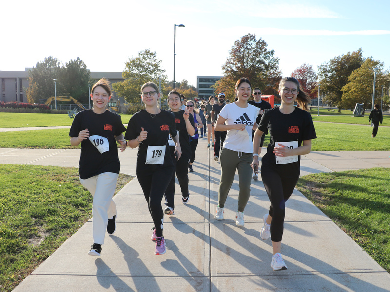 The Great Pumpkin Run on Oct. 21 helped kick off Family and Friends Weekend with nearly 100 participants enjoying warm autumnal weather as well as cider, donuts, crafts and more. (Photo by Evan White/Campus Recreation)
