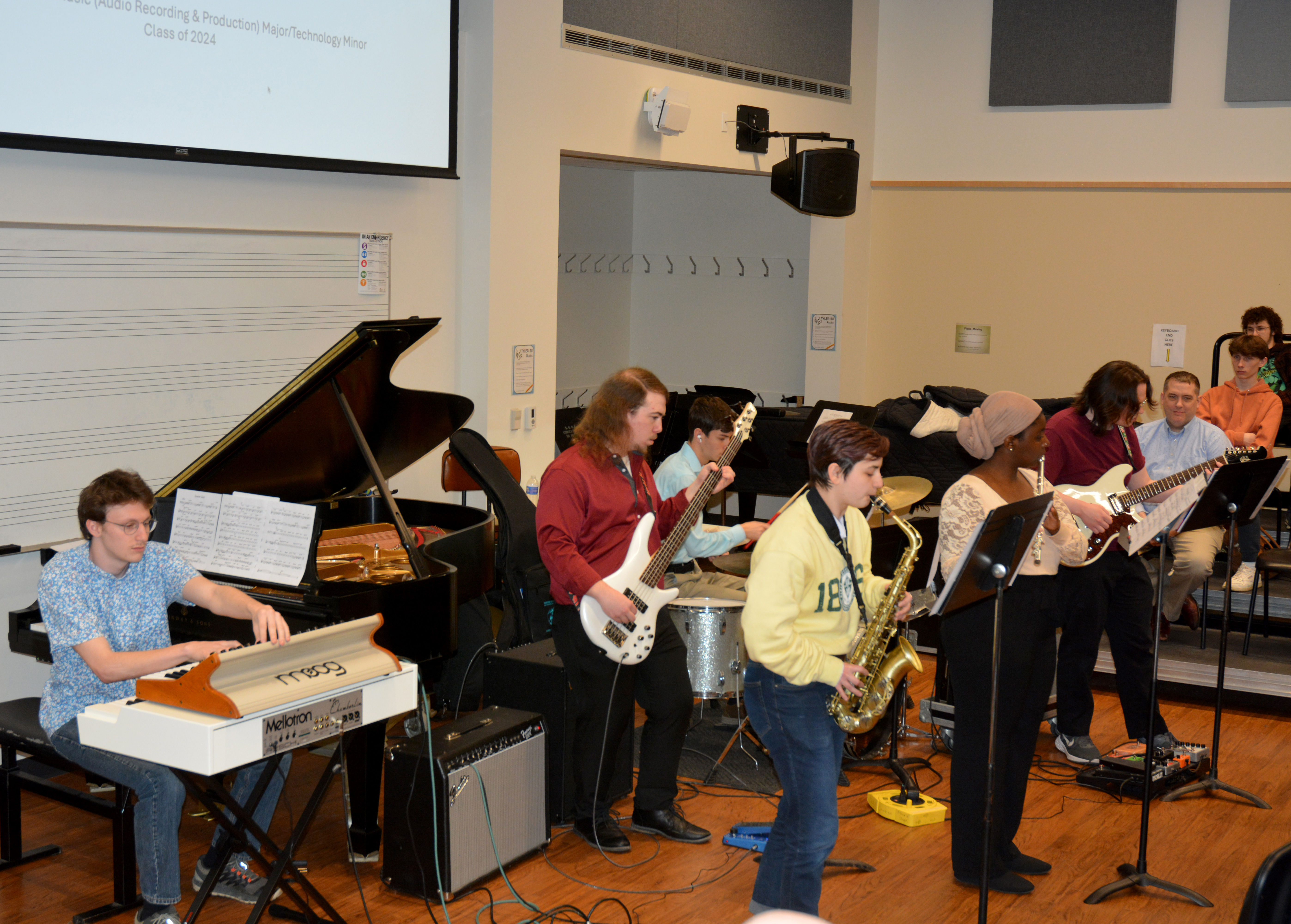 The Quest presentation “Songs We Love: Adapting a Broad Range of Music for a Jazz Small Group” featured members of the Jazz Small Group performing songs they selected and arranged under the direction of music professor Eric Schmitz. Student performers included Angelo Antonelli on keyboards, Yakira Jack on flute, Cece Caselli on saxophone, Hayden Arlington on bass, Nicholas Thielemann on guitar and Logan Russo on drums.