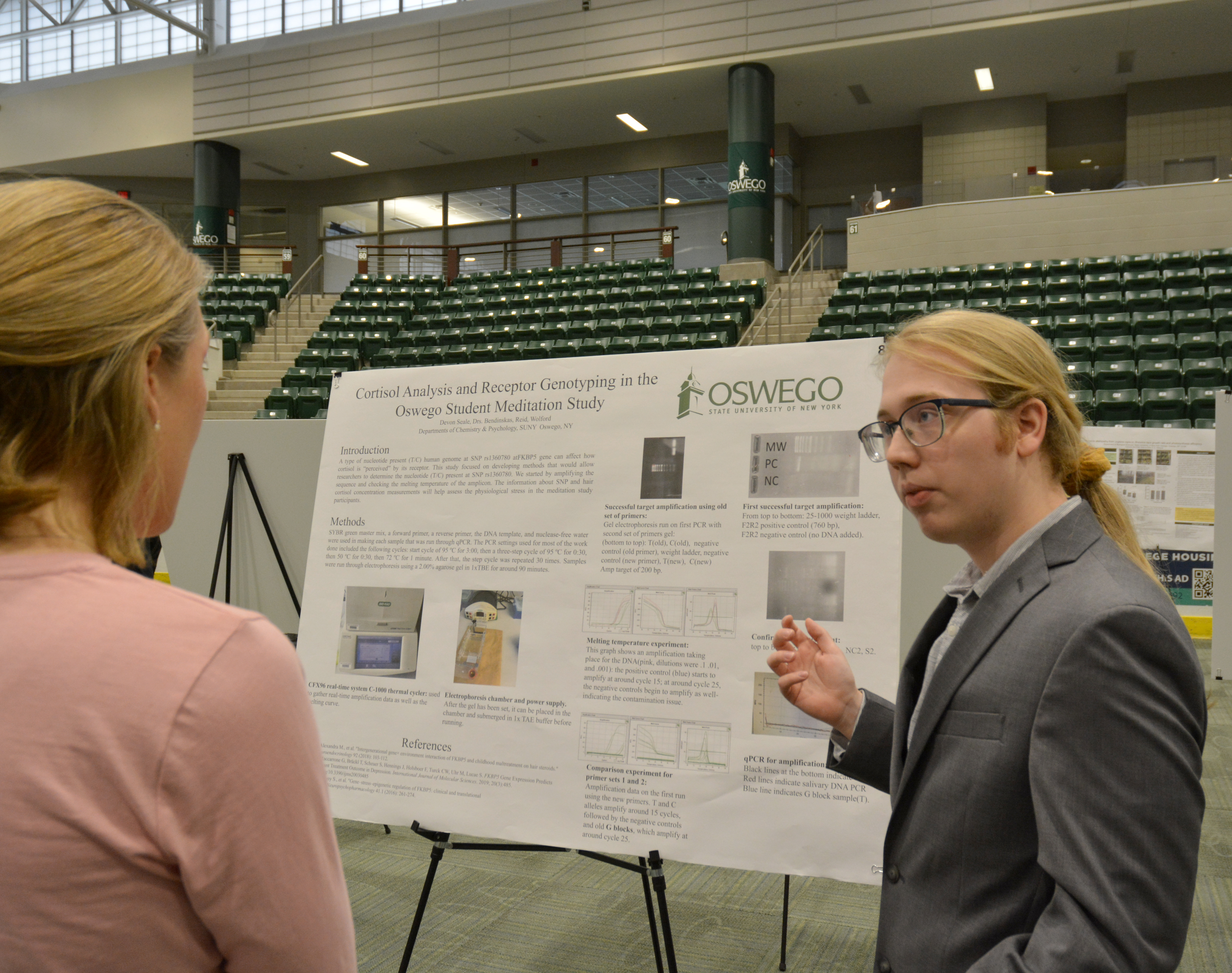 At Quest, biochemistry major Devon Seale presents a poster titled “Cortisol Analysis and Receptor Genotyping in the Oswego Student Mediation Study," developed with faculty mentors Kestas Bendinskas of the chemistry faculty and psychology faculty members Karen Wolford and Staceyann Reid.