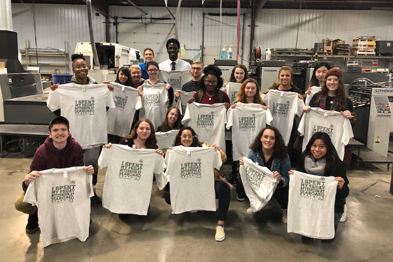 Students who attended Seaboard Graphics visit show off new T-shirts