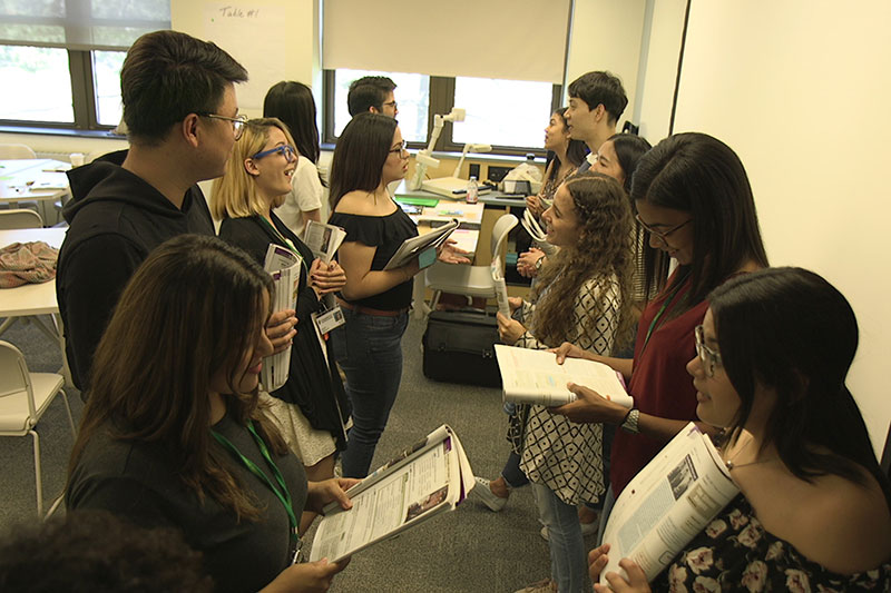 International learners interacting in a classroom