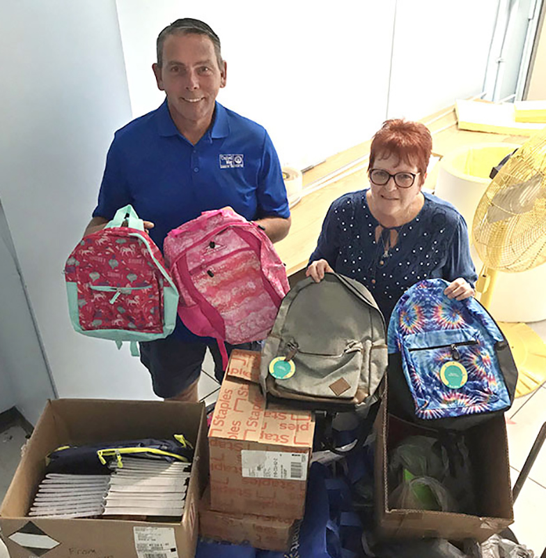 The college collected many school supplies for the annual Stuff A Bus effort for kids who need them