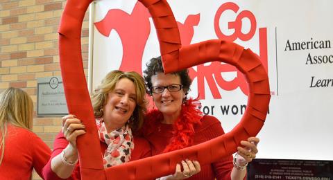 Staff posing with heart