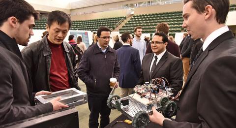 Students demonstrating a robotic car