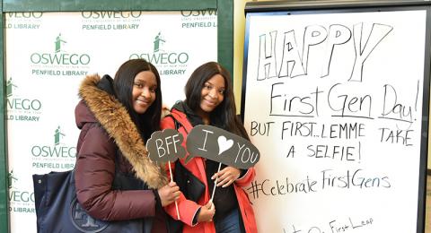 Denasia Wilson (left), a human development major, and Deneisha Wilson, a history major, celebrate First-Generation Students Day