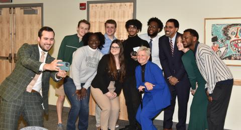 Chancellor John B. King Jr. poses for a selfie with students