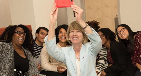 SUNY Chancellor Kristina M. Johnson takes photo with education students
