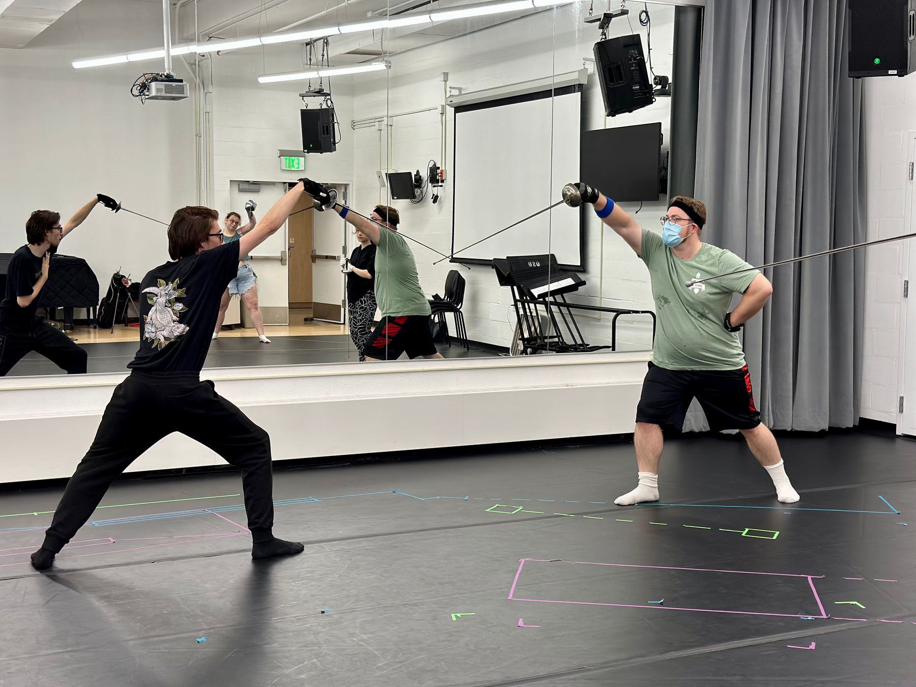 Students in Professor Whit Emerson’s Theatre 470: Special Topics: Stage Combat class learned how to perform a realistic-looking sword fight scene. Students worked in pairs to practice their skills.