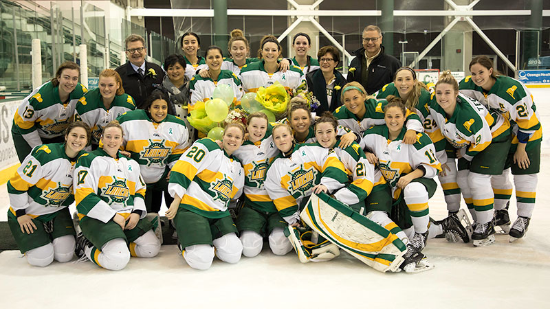 Women's hockey players celebrate Senior Day