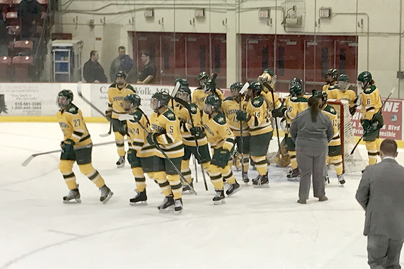 Laker women's hockey team heads for the postgame handshake line