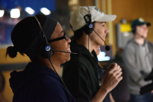 Students in the television broadcasting studio