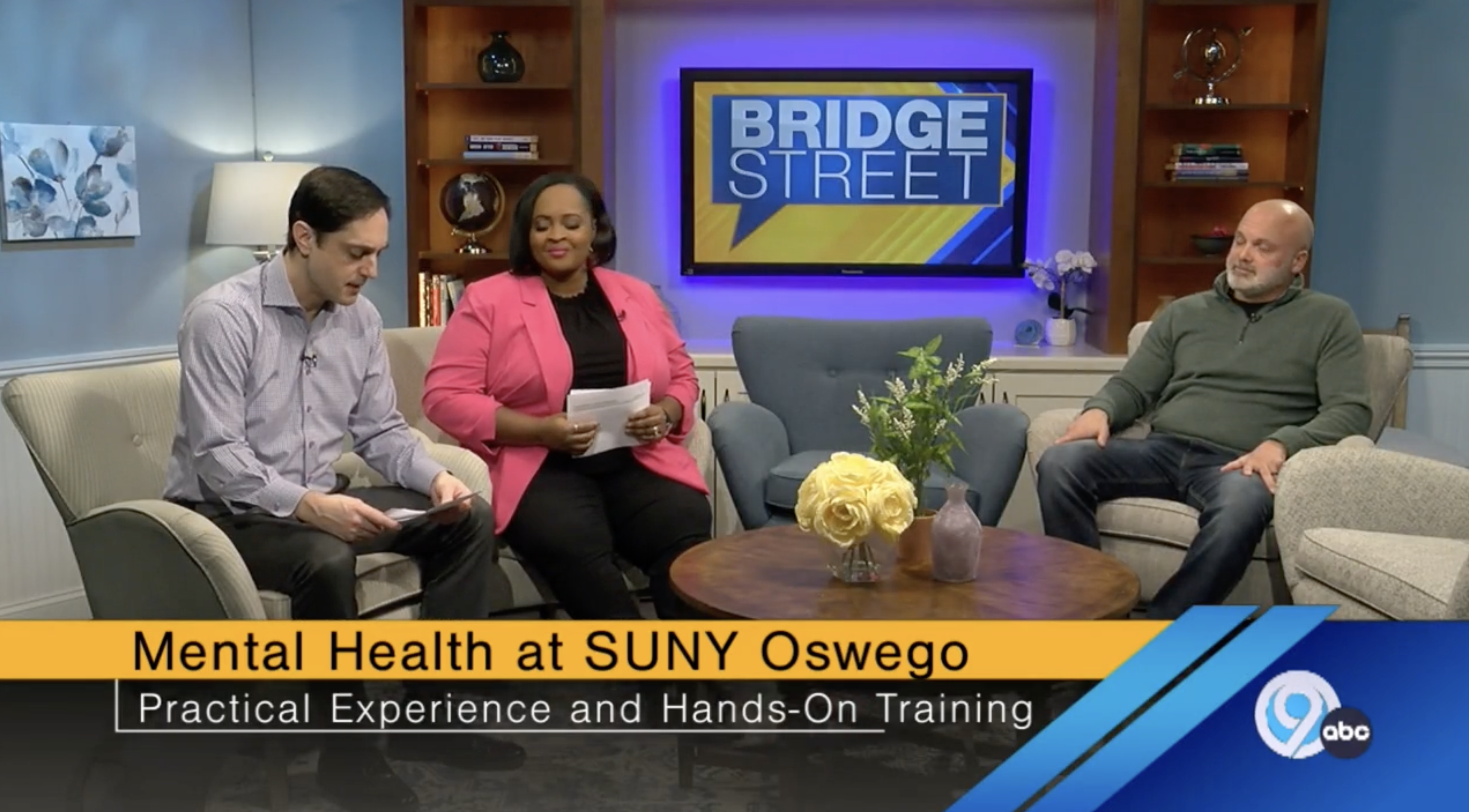 screenshot of the segment on bridgestreet with two hosts and suny oswego professor