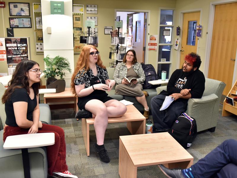 Creative writing students workshop new pieces in class