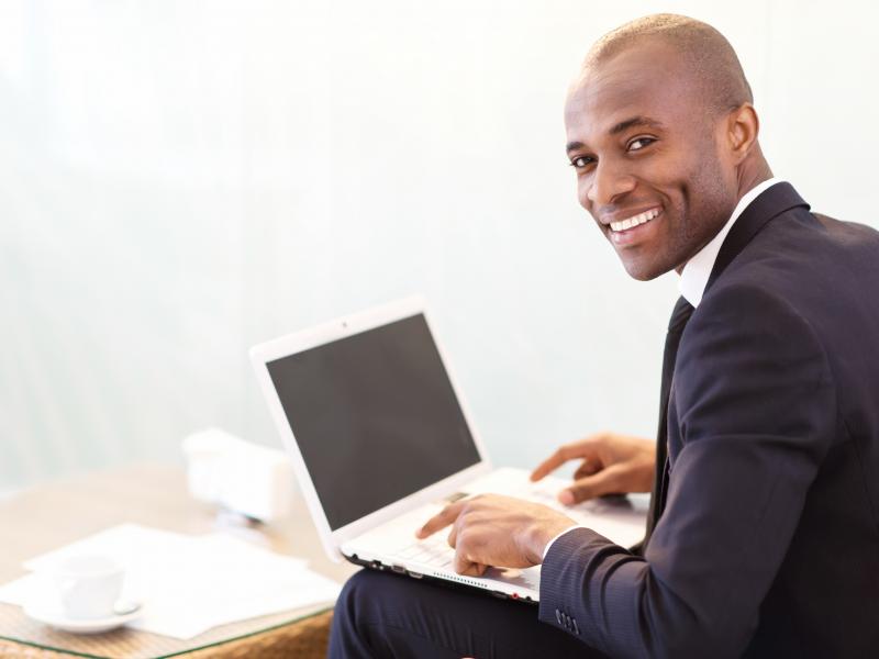 online student male on computer online student male on computer