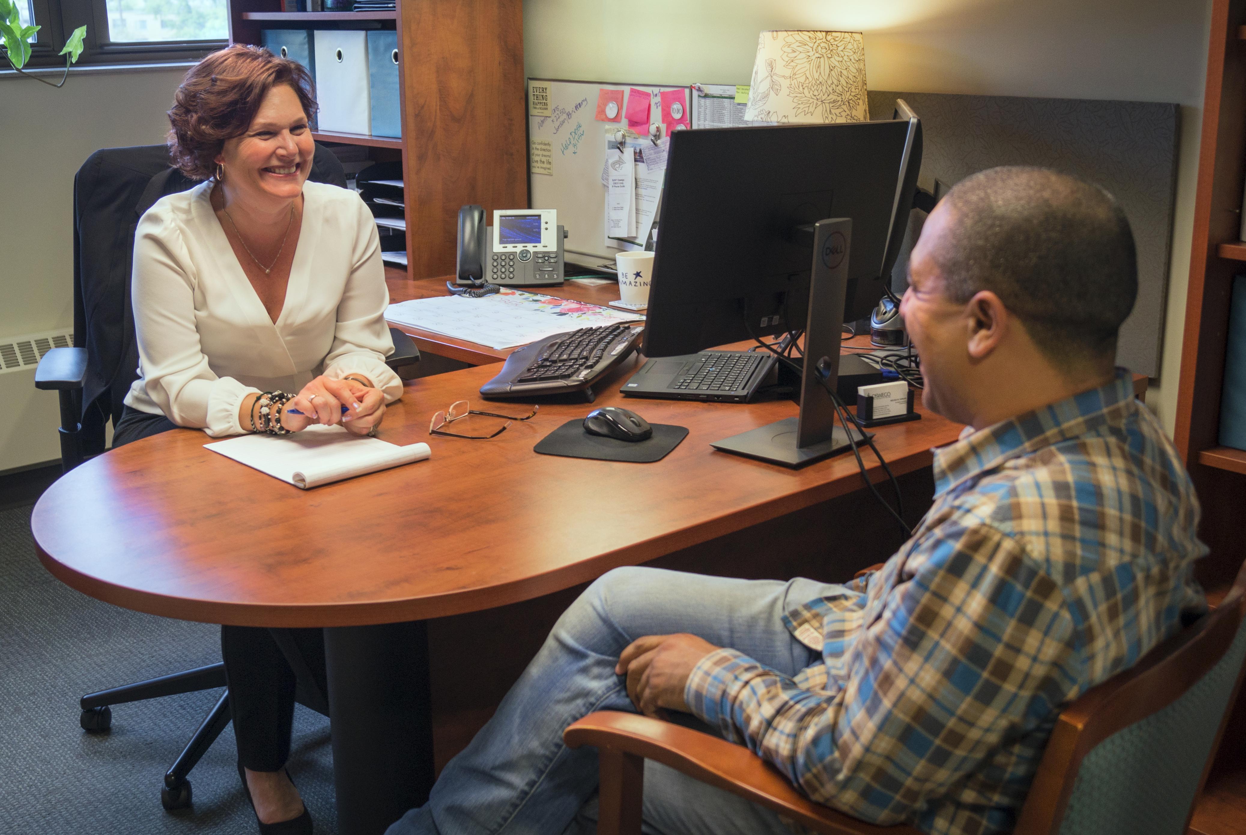 Syracuse campus advisor and student