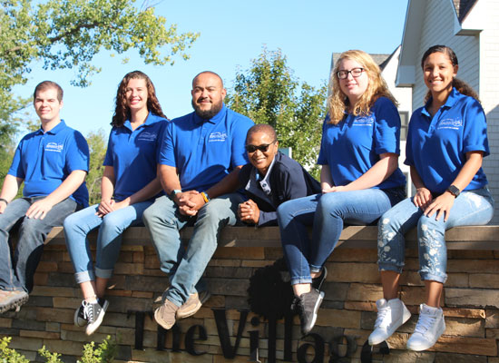 The Village Townhouses "Village Community Assistants" group photo. We are ready to welcome you!