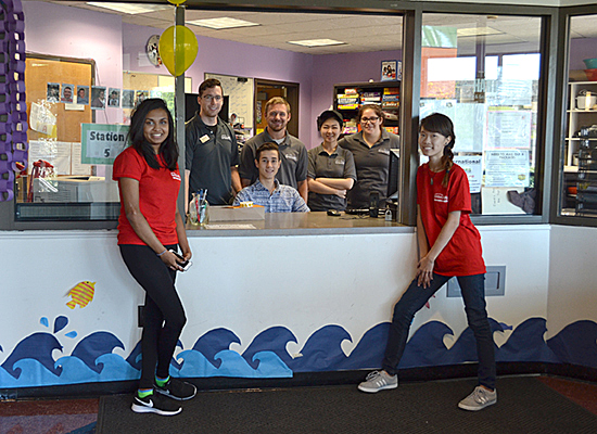 Hart Hall front desk helpers and Red Carpet Welcoming Crew at the front desk.