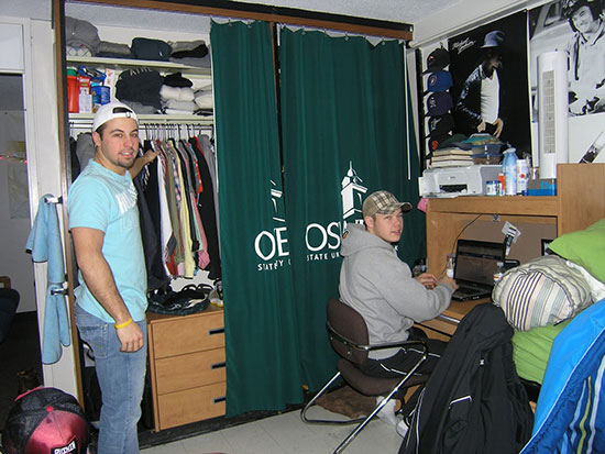 2 male students in an Onondaga Hall room.