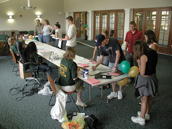 New student check-in day in the Johnson Hall main lounge.