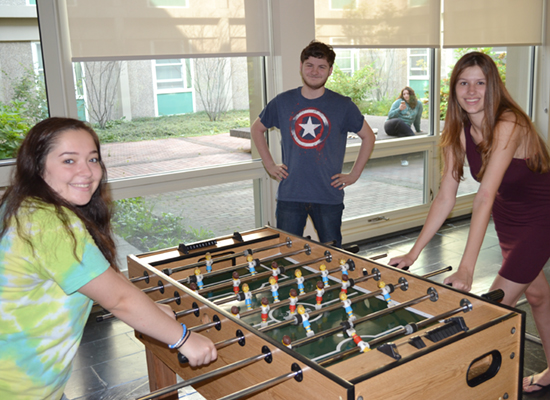Oneida Hall lounge is a great place to meet up with friends for a game of foosball.