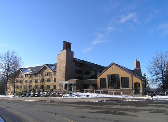 Riggs Hall in winter, blue skies.