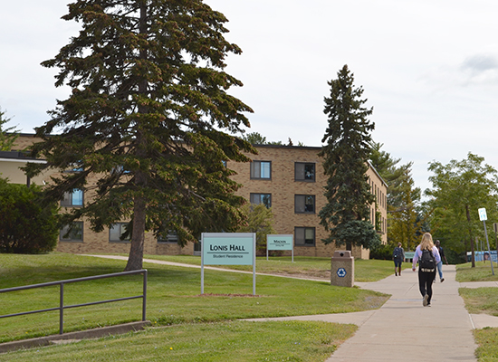 Lonis Hall (part of the Mackin Complex) sign on the front lawn of the building.