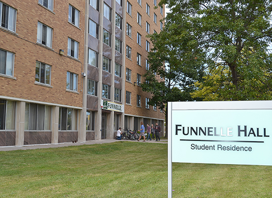 Funnelle Hall entrance and sign.