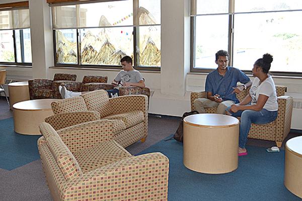 Hart Hall residents relax in the second floor lounge.