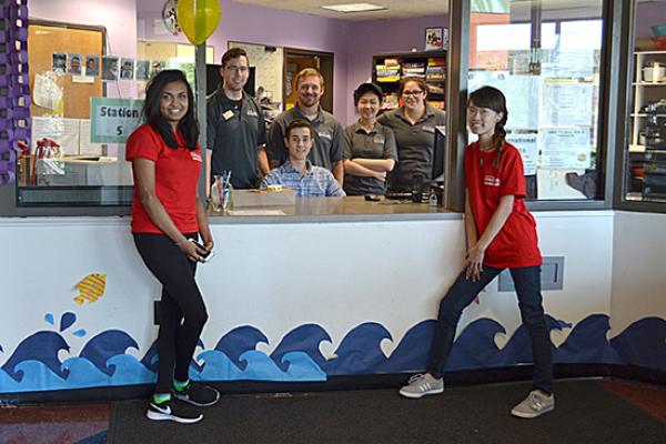 Hart Hall front desk helpers and Red Carpet Welcoming Crew at the front desk.
