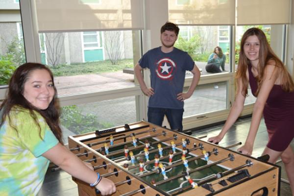 Oneida Hall lounge is a great place to meet up with friends for a game of foosball.