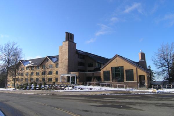 Riggs Hall in winter, blue skies.