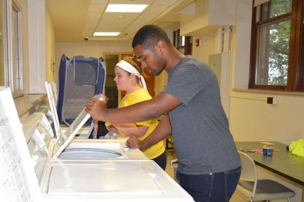 Johnson residents do their laundry in a clean and spacious facility located in the basement of Johnson Hall.