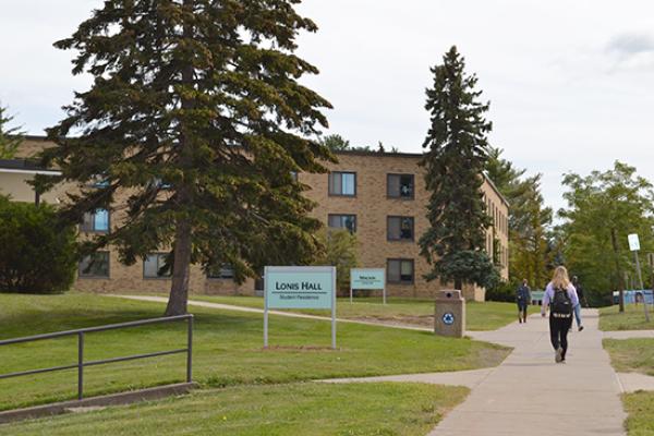 Lonis Hall (part of the Mackin Complex) sign on the front lawn of the building.
