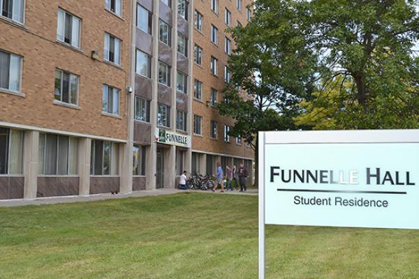 Funnelle Hall entrance and sign.