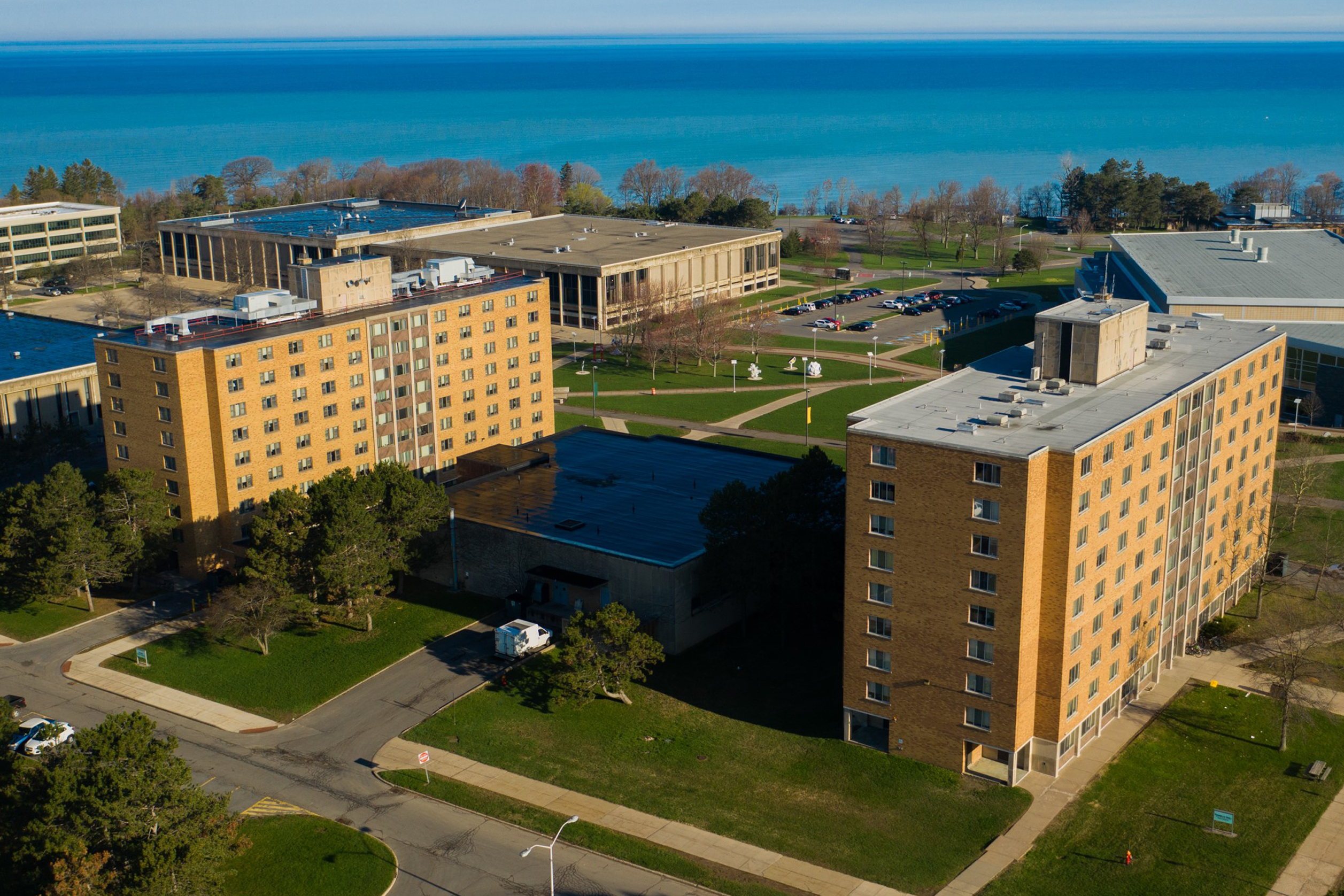 Aerial drone shot of central campus halls (from left, Hart Hall, Cooper Dining and Fitness Center, Funnelle Hall)