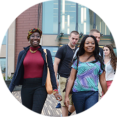 Students walking in front of Shineman Center