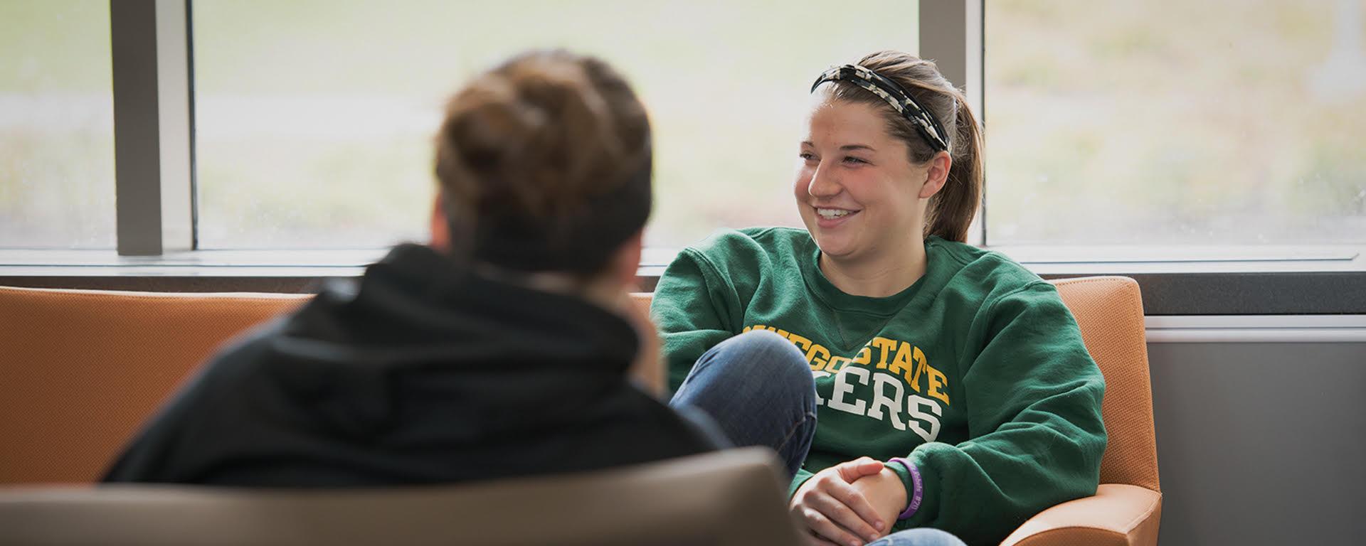 Students relaxing and smiling