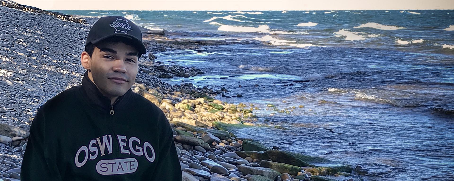 Daniel Garcia stands beside the waters of Lake Ontario